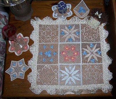 Table covering I made with these lace blocks and also coasters